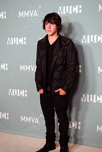 Photo of Munro Chambers, who plays Greg Ammon